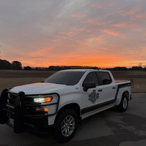 Chevrolet Silverado with a sunrise in the background